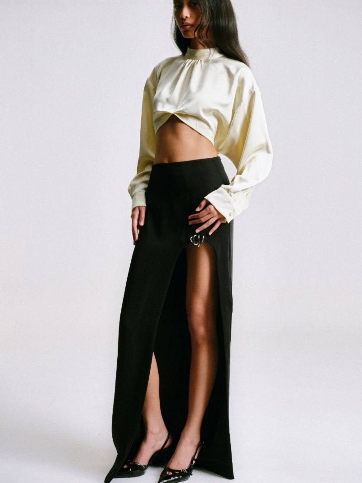 MAXI SKIRT WITH CUT-OUT SLIT AND PIERCING DETAIL
