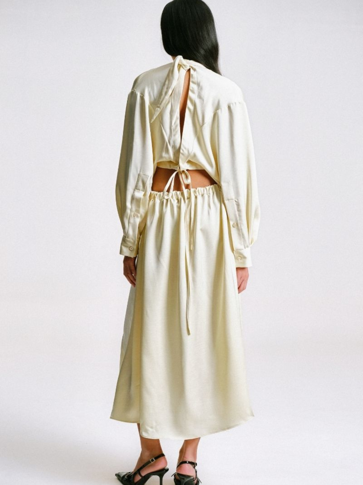 CUT-OUT DRESS WITH PIERCING DETAILS