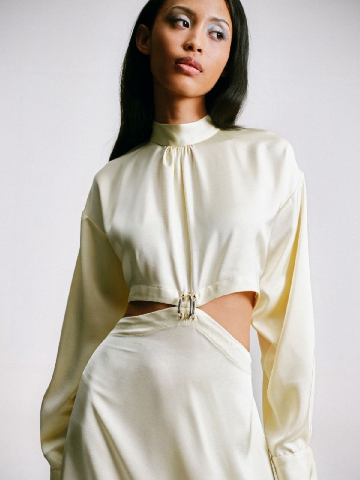 CUT-OUT DRESS WITH PIERCING DETAILS