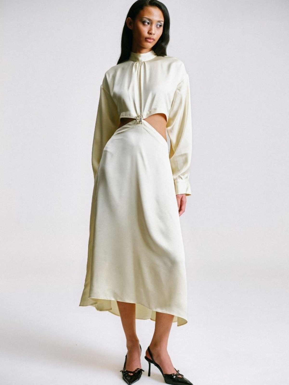 CUT-OUT DRESS WITH PIERCING DETAILS