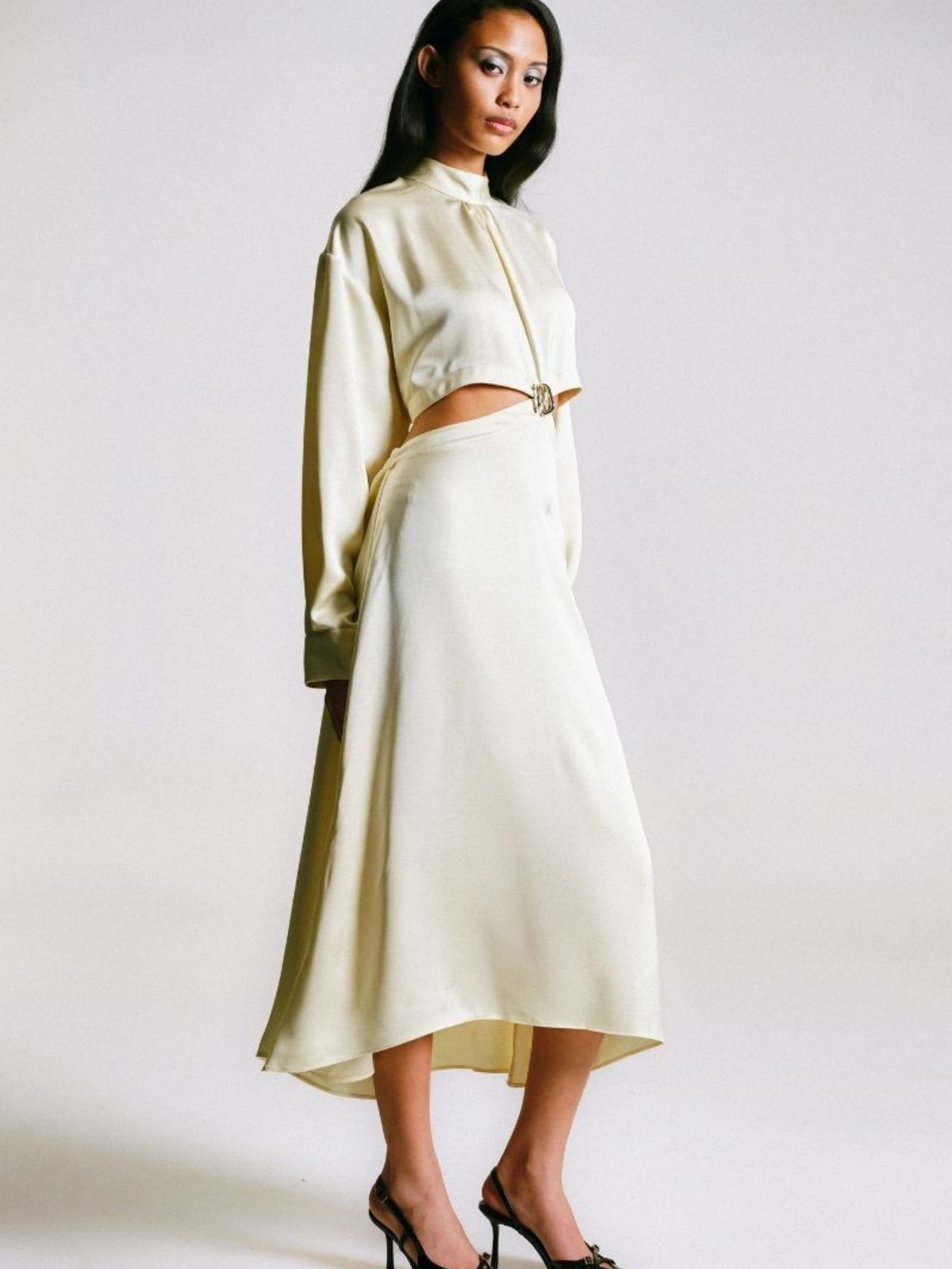 CUT-OUT DRESS WITH PIERCING DETAILS