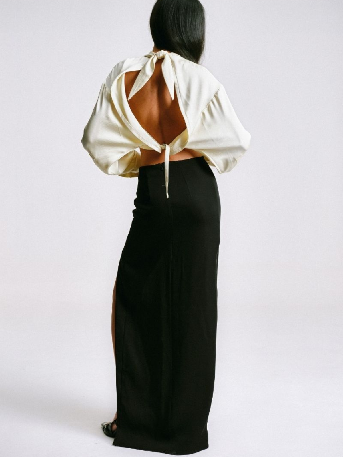 MAXI SKIRT WITH CUT-OUT SLIT AND PIERCING DETAIL