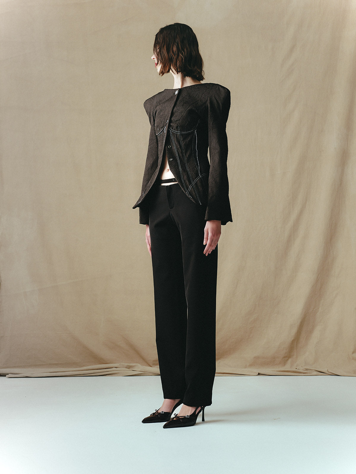 LOW-RISE TROUSERS WITH BUCKLES