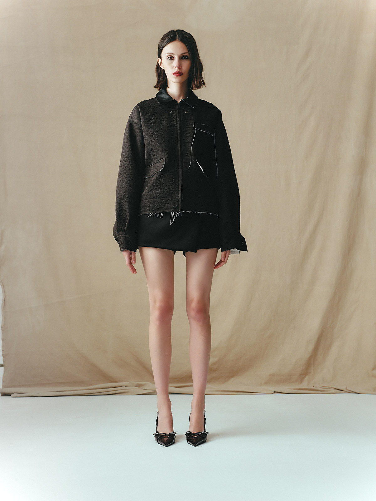 CRINKLED BLOUSON WITH EMBELLISHMENTS AND LEATHER COLLAR