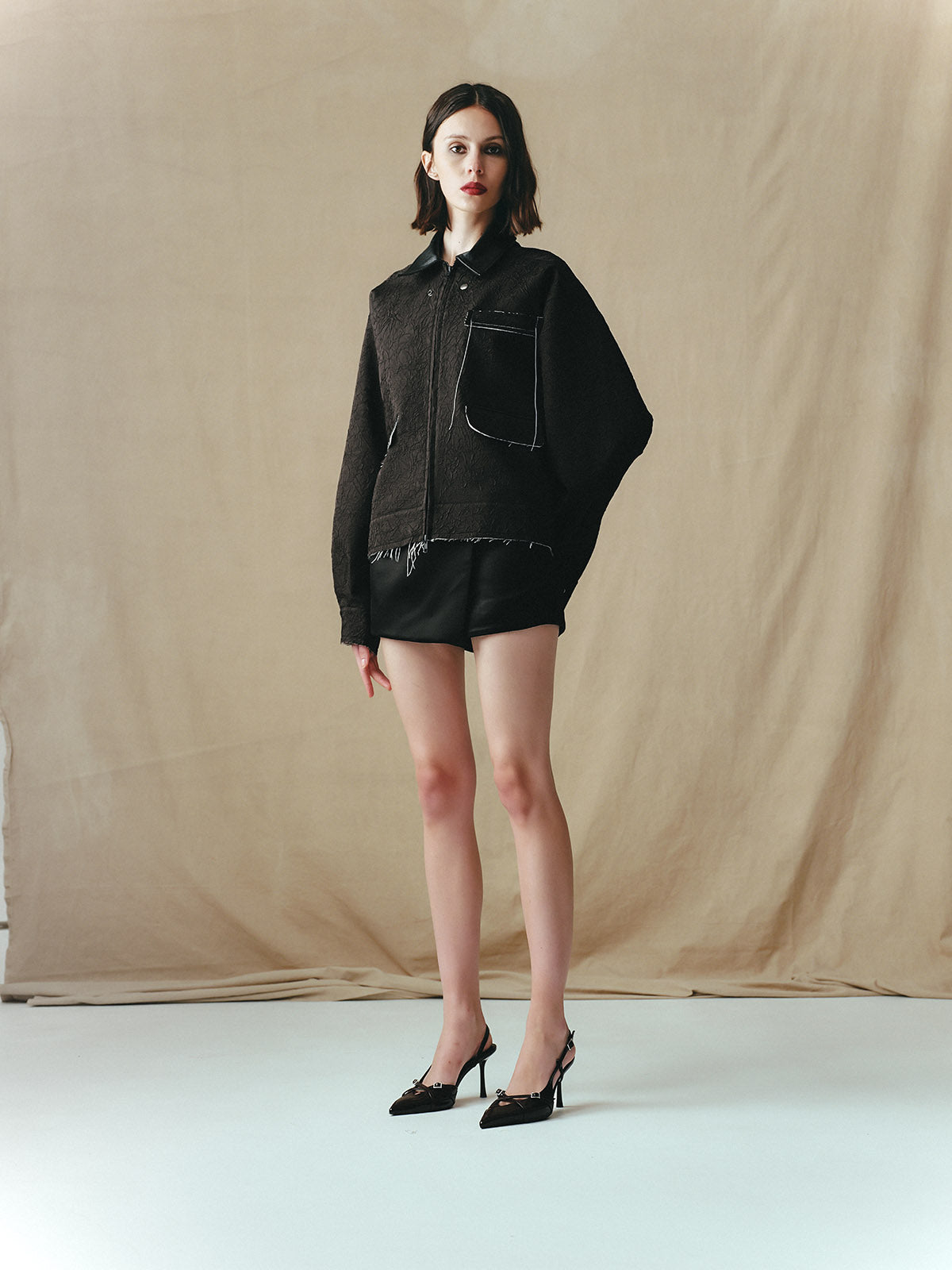 CRINKLED BLOUSON WITH EMBELLISHMENTS AND LEATHER COLLAR