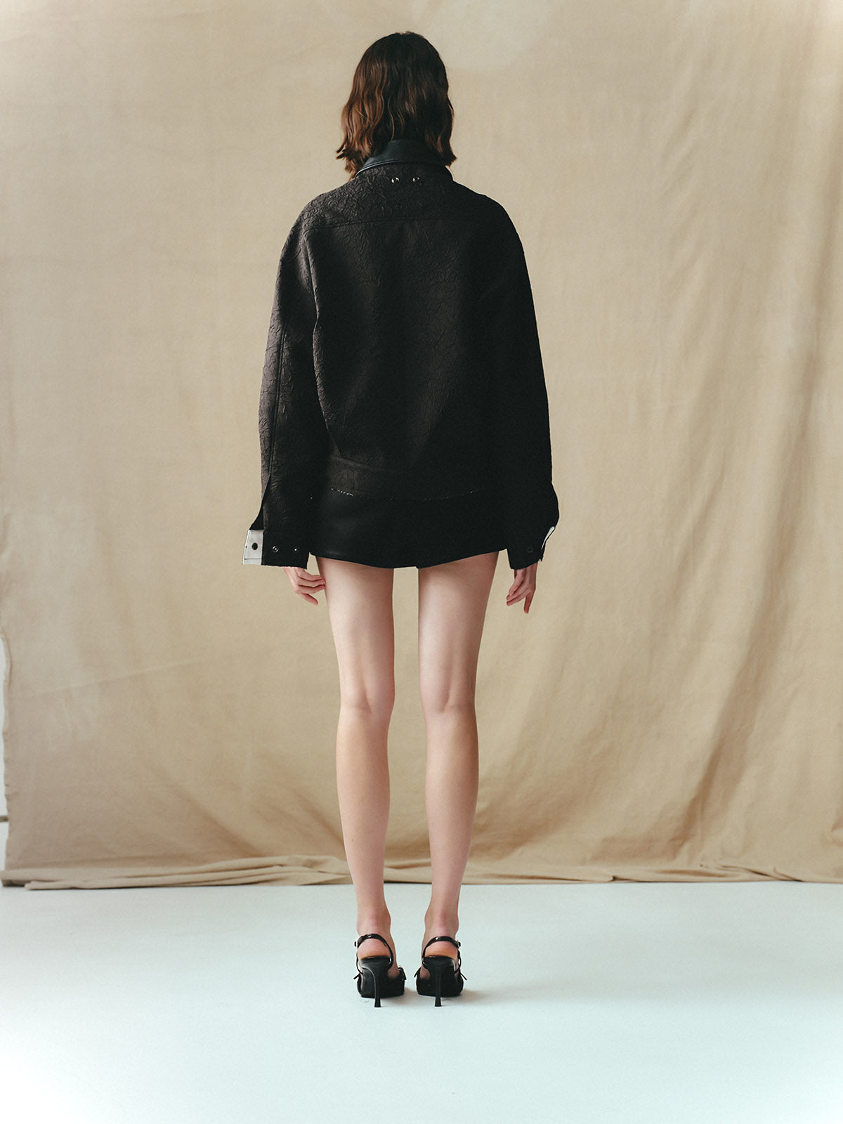 CRINKLED BLOUSON WITH EMBELLISHMENTS AND LEATHER COLLAR