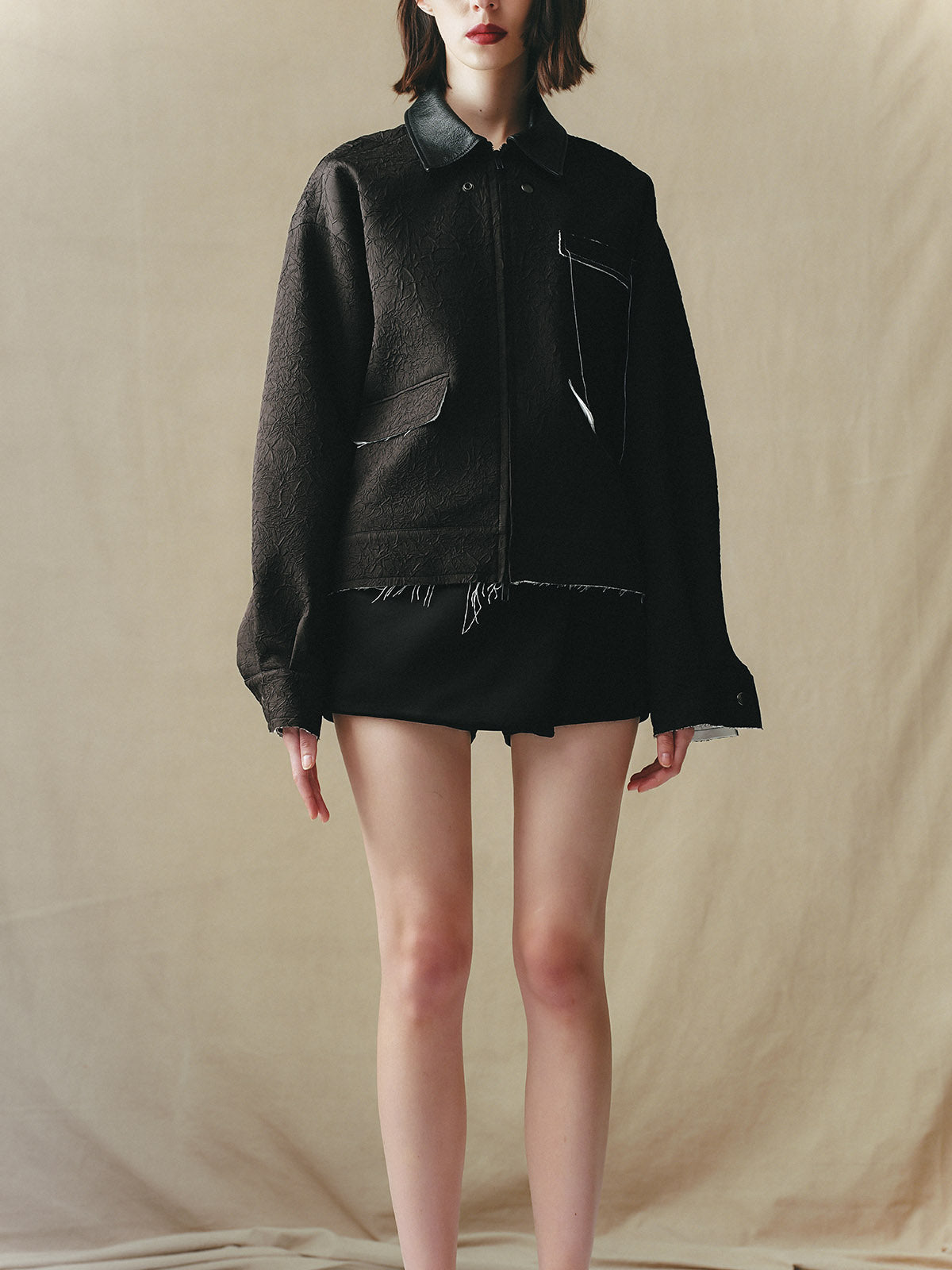 CRINKLED BLOUSON WITH EMBELLISHMENTS AND LEATHER COLLAR