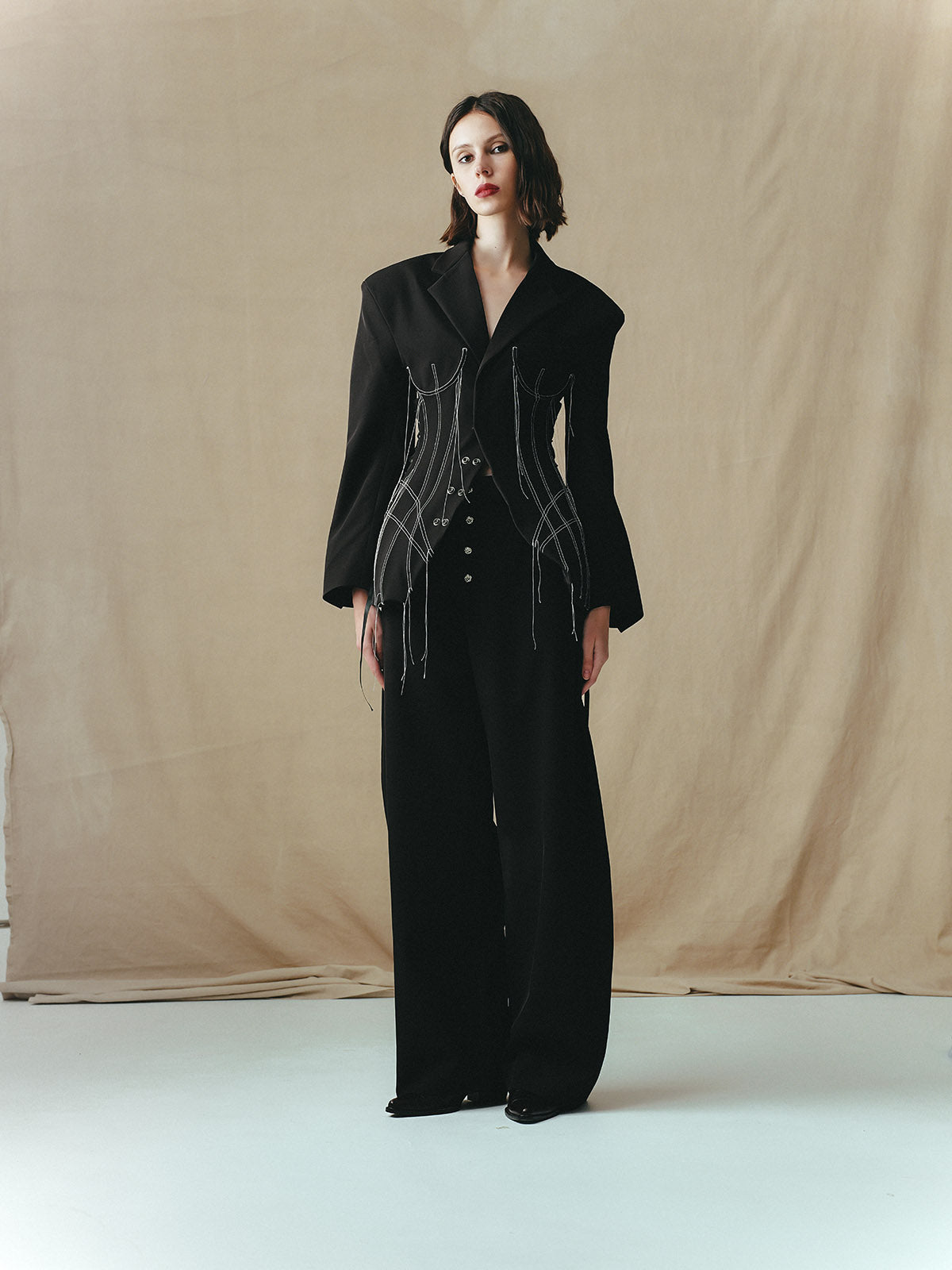 TAILORED SUIT WITH INSERTED CORSET PANELS