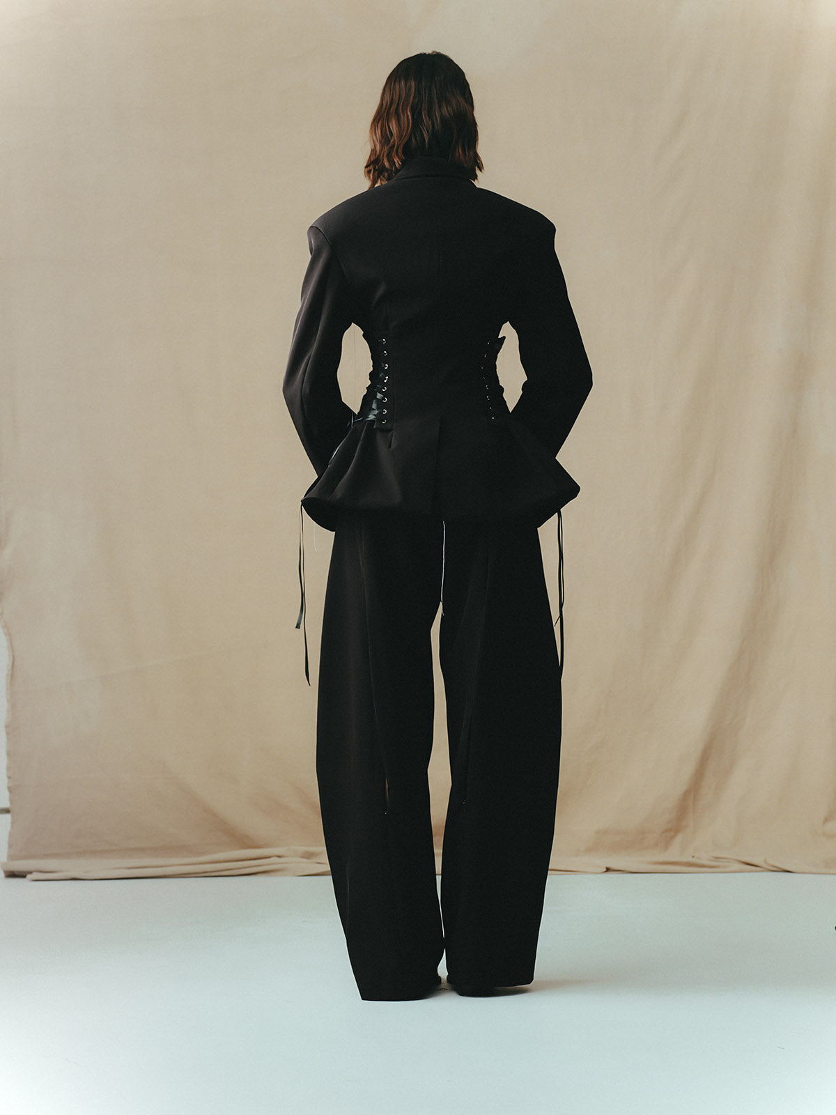 TAILORED SUIT WITH INSERTED CORSET PANELS